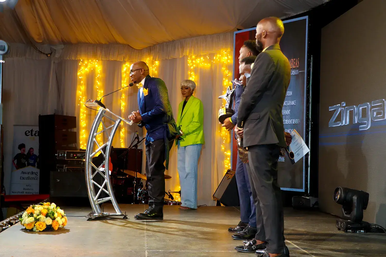 Award recipients lined up on stage at the ETA Awards